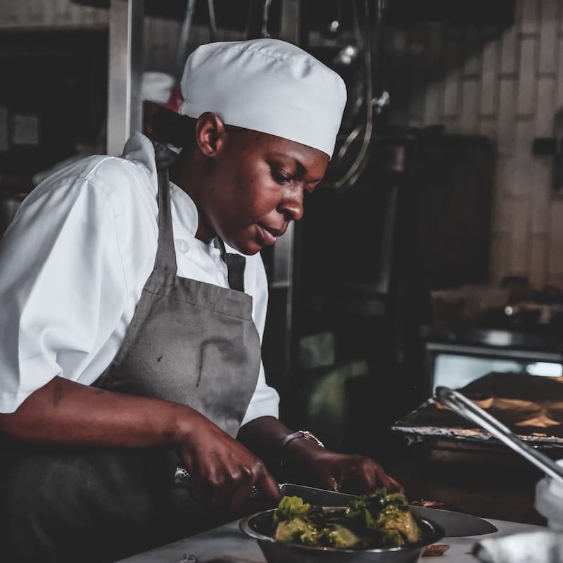 Photo of a chef cocking delicious food